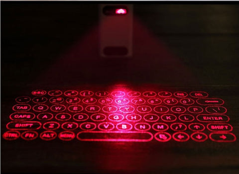 Virtual Laser Keyboard Bluetooth Wireless Projector projecting a red holographic keyboard onto a surface.